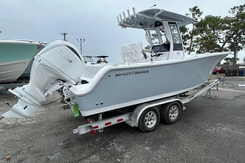 Slide: The Image of 2026 Sportsman Open 252 Center Console boat on trailer, featuring Yamaha outboard motor. - 5