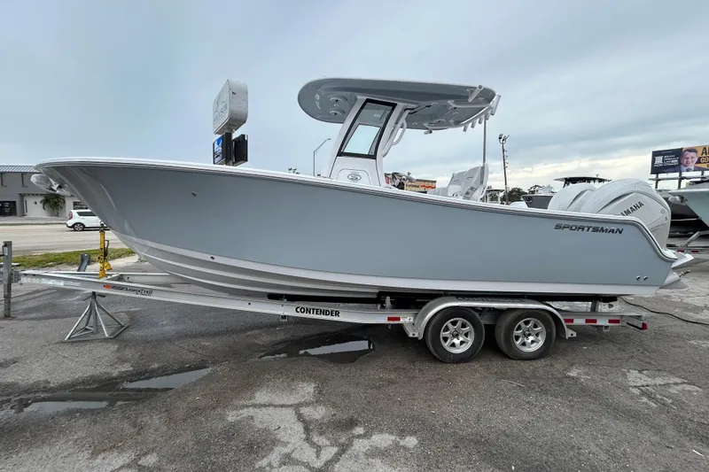 Slide: The Image of 2026 Sportsman Open 252 Center Console boat on trailer, side view. - 6