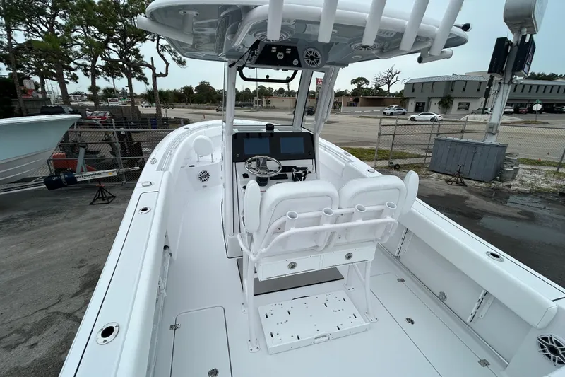 Slide: The Image of 2026 Sportsman Open 252 Center Console boat, featuring sleek design and advanced navigation equipment. - 7
