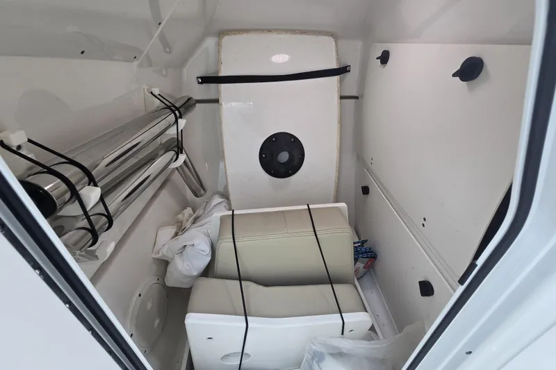 Slide: The Image of Control panel of 2020 Pursuit DC 266 Dual Console boat with switches and dials. - 10