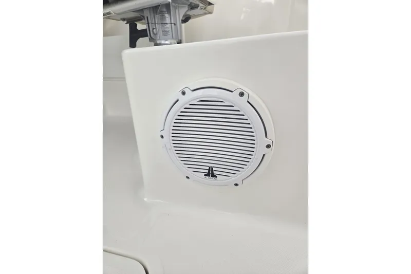 Slide: The Image of 2020 Pursuit DC 266 Dual Console boat bathroom with sink and toilet. - 32