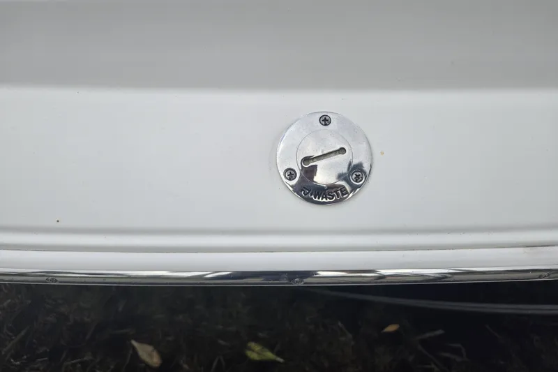 Slide: The Image of 2020 Pursuit DC 266 Dual Console boat interior storage compartment. - 9