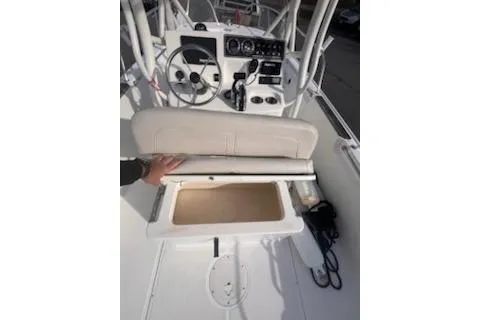 Slide: The Image of 2021 Boston Whaler 190 Montauk boat console with steering wheel and controls. - 11