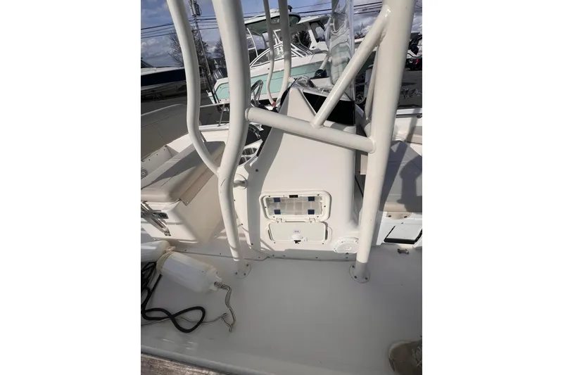 Slide: The Image of 2021 Boston Whaler 190 Montauk boat interior with seating and storage compartments. - 13