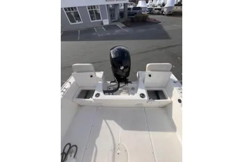Slide: The Image of 2021 Boston Whaler 190 Montauk boat console with steering wheel and controls. - 5