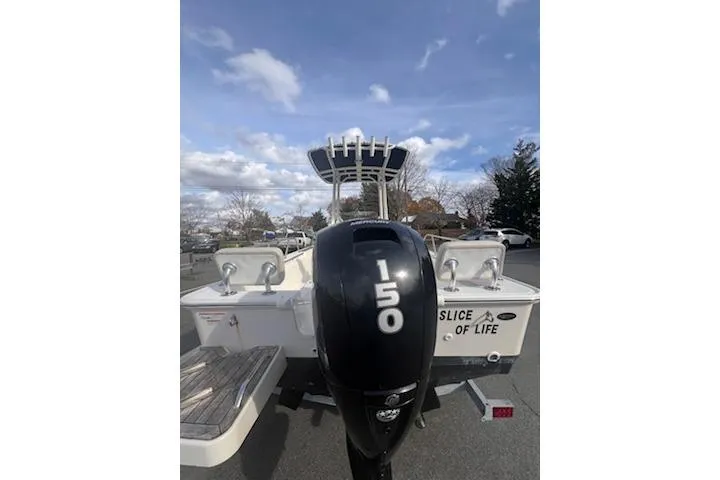 Slide: The Image of 2021 Boston Whaler 190 Montauk boat interior with seating and storage. - 7