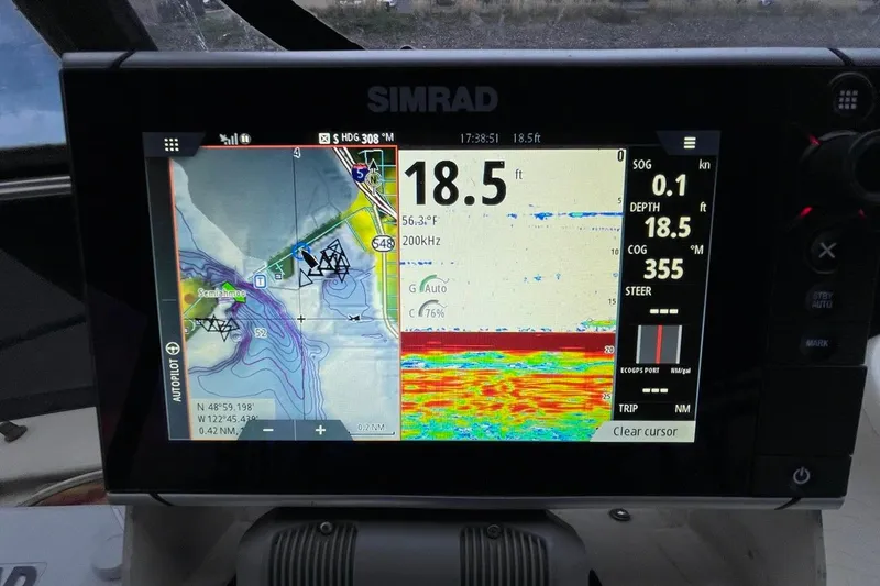 Slide: The Image of Simrad navigation display on 1987 Californian 55 Cockpit Motor Yacht showing depth and map. - 39