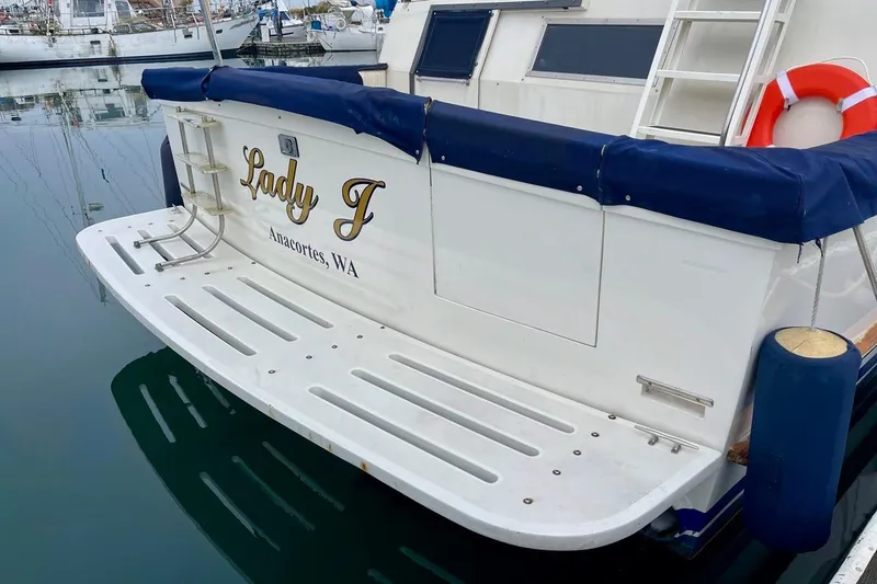 Slide: The Image of 1987 Californian 55 Cockpit Motor Yacht "Lady J" docked in Anacortes, WA marina. - 41