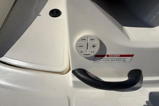 Slide: The Image of 2017 Sea Ray SPX 190 Outboard boat control panel with Fusion audio controls. - 25