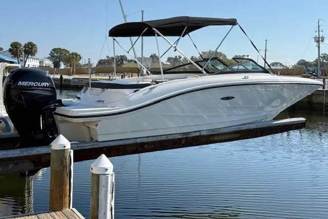 Slide: The Image of 2017 Sea Ray SPX 190 Outboard boat docked with Mercury engine. - 8