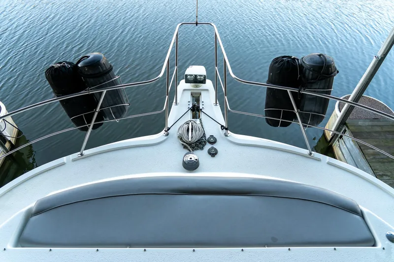 Slide: The Image of 1997 Harbor Master Stolkraft boat deck with railings and water view. - 37