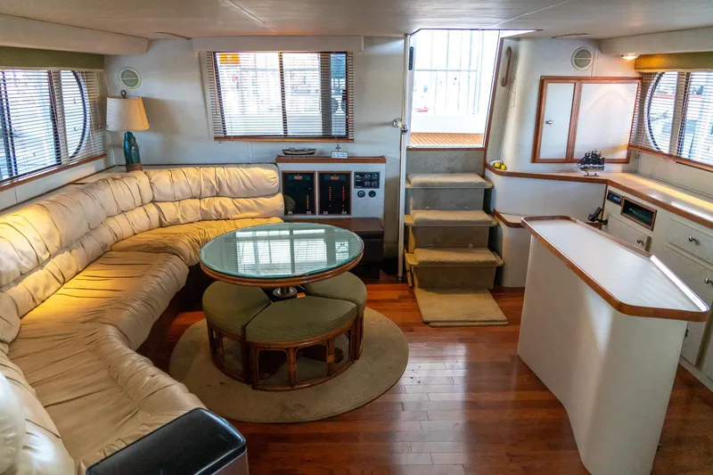 Slide: The Image of Luxurious 1997 Harbor Master Stolkraft yacht interior with plush seating and elegant decor. - 47