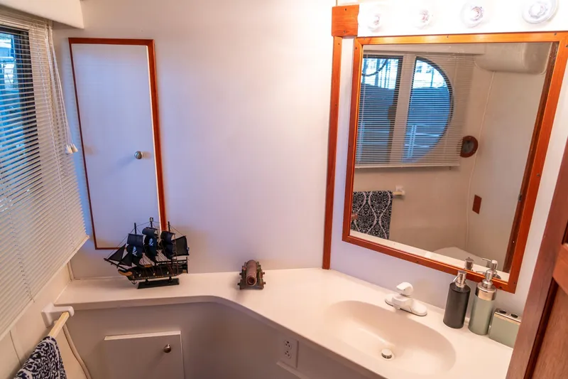 Slide: The Image of Bathroom interior of 1997 Harbor Master Stolkraft with nautical decor and modern fixtures. - 50