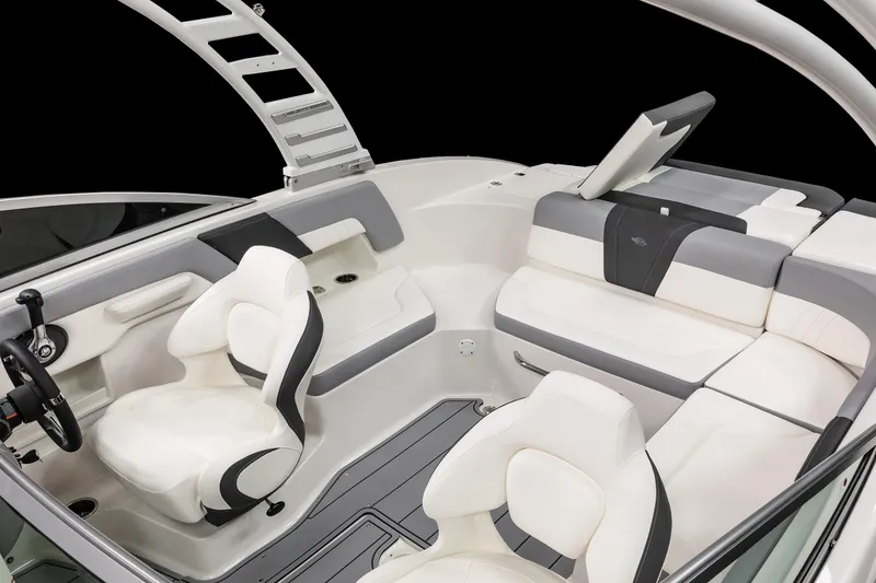 Slide: The Image of 2026 Chaparral 23 SSi boat interior with gray seating and steering wheel. - 37