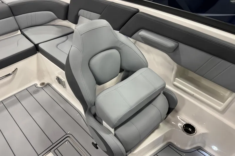 Slide: The Image of 2026 Chaparral 23 SSi boat interior with gray seating and modern design. - 39
