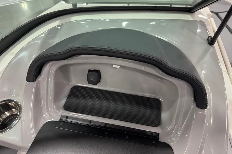 Slide: The Image of 2026 Chaparral 23 SSi boat interior detail with cup holder and storage compartment. - 41
