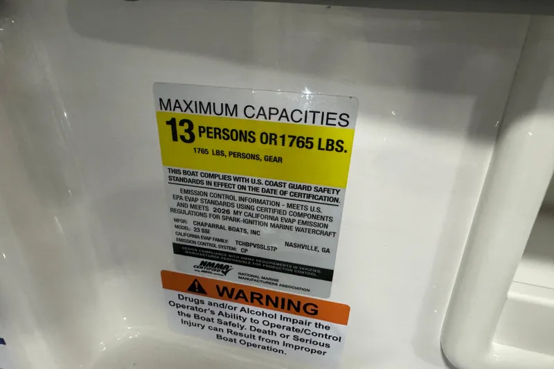 Slide: The Image of 2026 Chaparral 23 SSi capacity label: 13 persons or 1765 lbs, safety compliance. - 53