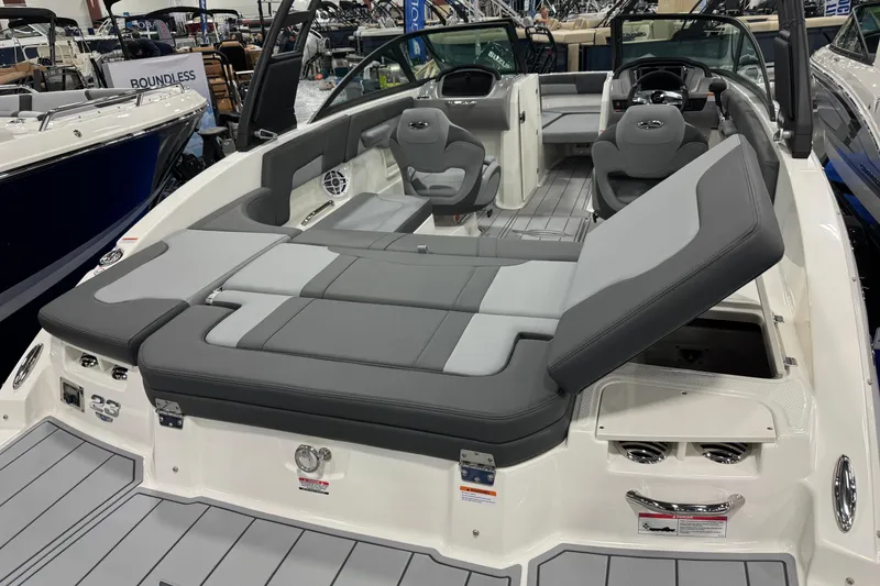 Slide: The Image of 2026 Chaparral 23 SSi boat interior with gray seating and modern design. - 59