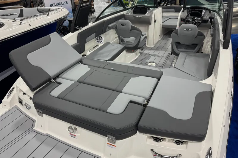 Slide: The Image of 2026 Chaparral 23 SSi boat interior with gray seating and modern design. - 60