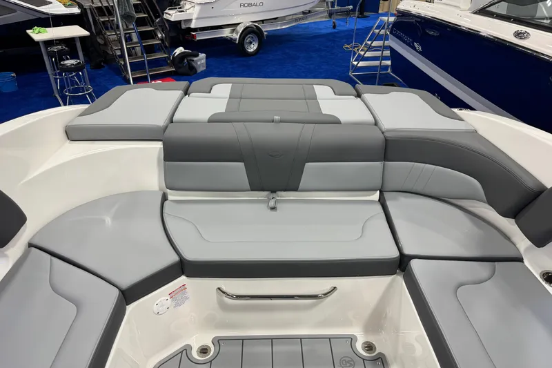 Slide: The Image of 2026 Chaparral 23 SSi boat interior with gray seating and modern design. - 63