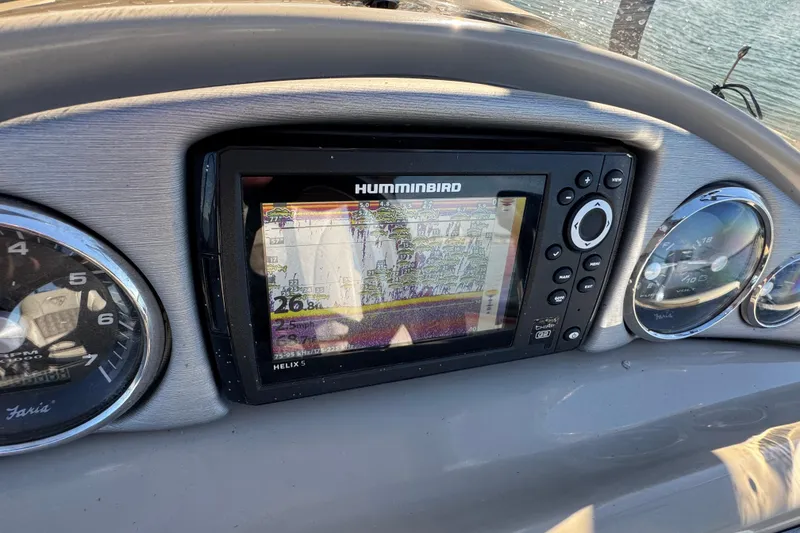 Slide: The Image of Dashboard of 2018 Trifecta SS 27RFE UDS XR with Humminbird Helix 5 fishfinder. - 15