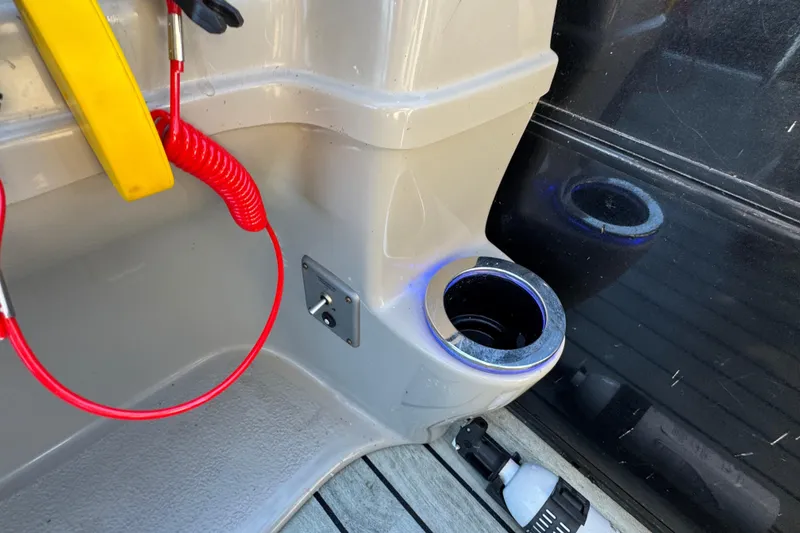 Slide: The Image of Interior of 2018 Trifecta SS 27RFE UDS XR with cup holder and safety lanyard. - 19