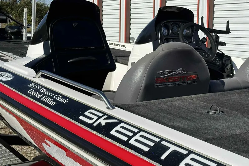 Slide: The Image of 2003 Skeeter ZX200 Bass Masters Classic Limited Edition boat with detailed interior view. - 17