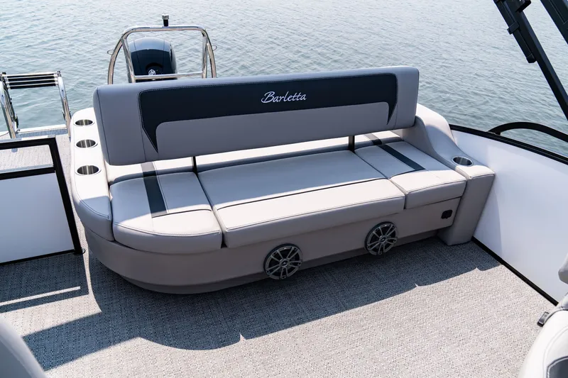 Slide: The Image of Barletta Aria 22 UC 2026, luxurious boat seating on calm water. - 6