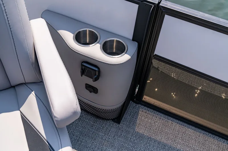 Slide: The Image of Interior of Barletta Aria 22 UC 2026 with cup holders. - 9