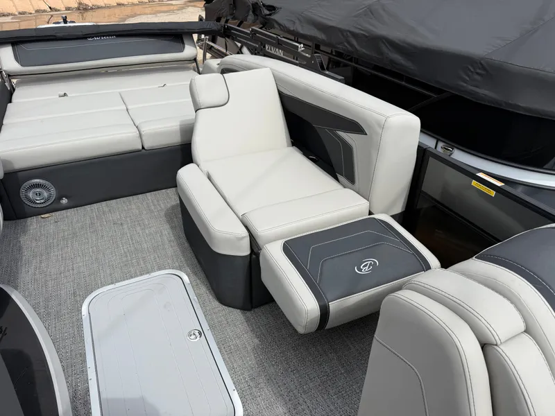 Slide: The Image of 2026 Barletta Cabrio 22 U pontoon boat, rear view with motor and seating area. - 5