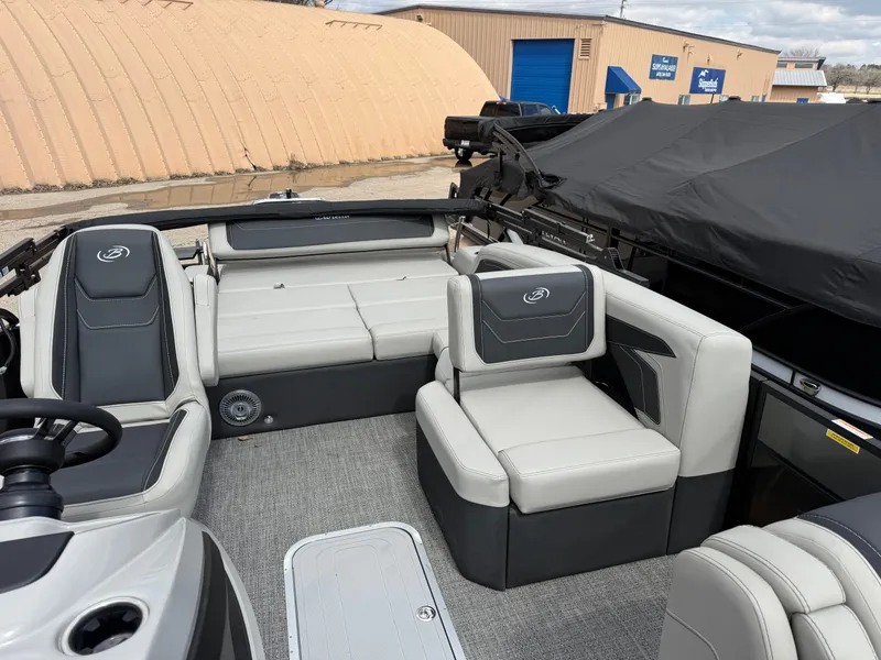 Slide: The Image of 2026 Barletta Cabrio 22 U pontoon boat parked outdoors. - 6