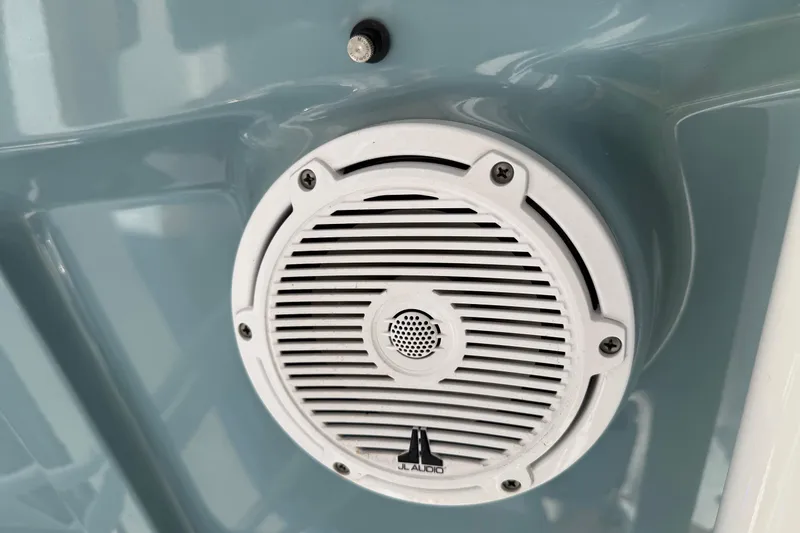 Slide: The Image of White JL Audio speaker on 2023 Sea Hunt Ultra 234 boat. - 20