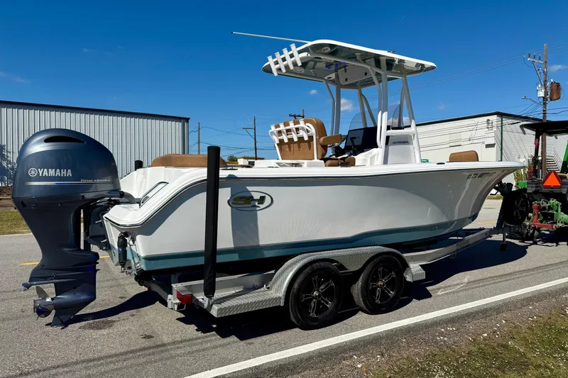 Slide: The Image of 2023 Sea Hunt Ultra 234 boat on trailer with Yamaha outboard motor. - 4