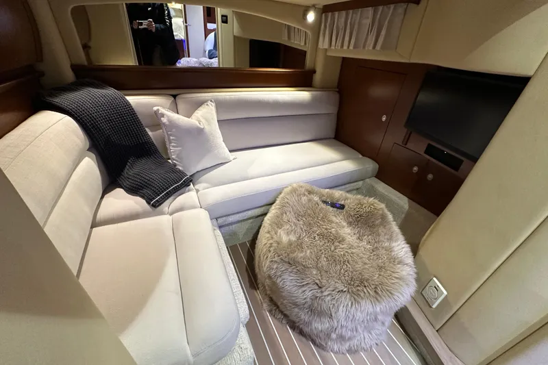 Slide: The Image of Luxurious interior of 2007 Sea Ray 44 Sundancer yacht with plush seating and modern decor. - 28