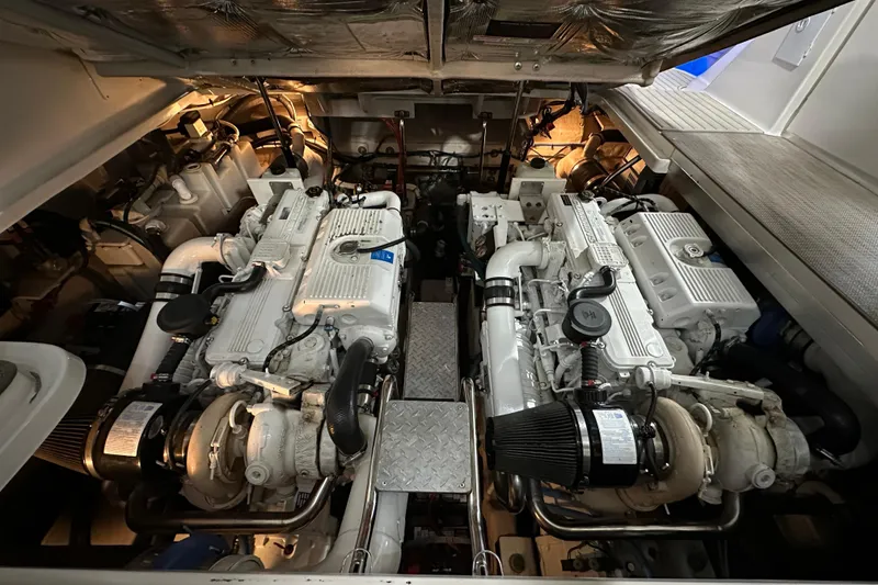 Slide: The Image of Engine room of a 2007 Sea Ray 44 Sundancer with dual engines. - 31