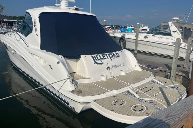 Slide: The Image of 2007 Sea Ray 44 Sundancer boat named "Lilleypad" docked in Spring Lake, MI. - 4