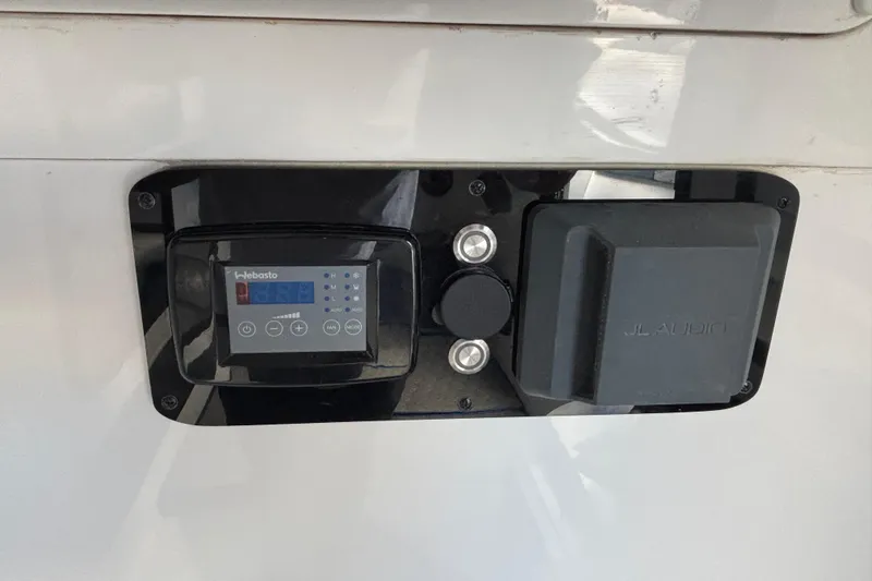 Slide: The Image of Control panel and audio system on 2024 GSX 36 model. - 15