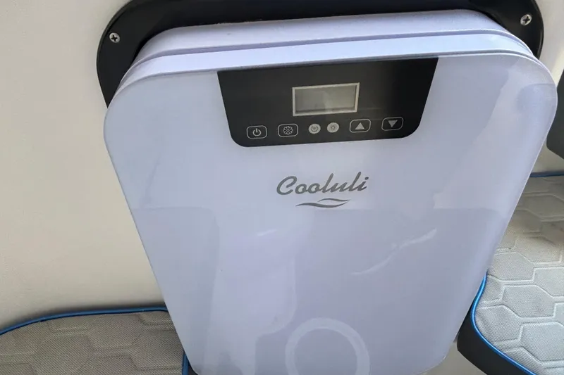 Slide: The Image of 2024 GSX 36 model featuring a Cooluli mini fridge with digital display. - 12