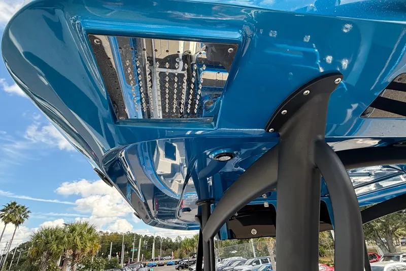 Slide: The Image of 2024 GSX 36 boat underside view with blue hull and support structure. - 29