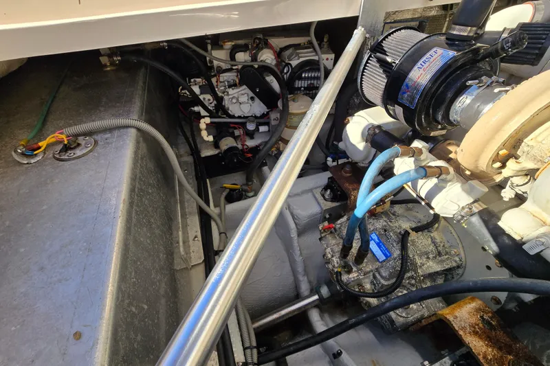 Slide: The Image of 2001 Mainship 30 Pilot Rum Runner boat interior sink area with countertop and faucet. - 25