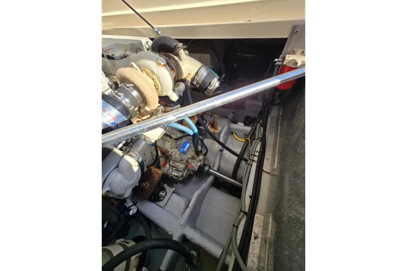 Slide: The Image of 2001 Mainship 30 Pilot Rum Runner boat interior with compact bathroom and storage. - 26