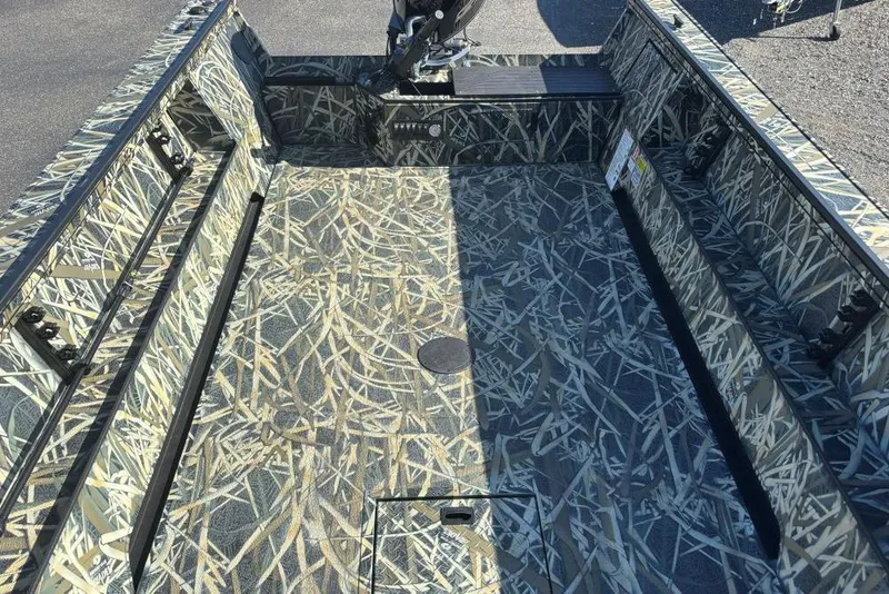 Slide: The Image of 2026 Smoker Craft Pro Sportsman 1872 T boat interior with camouflage design. - 7