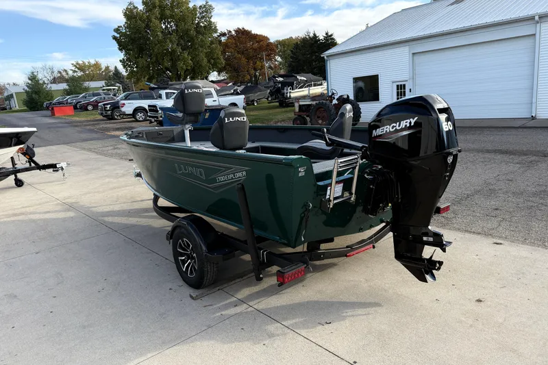 Slide: The Image of 2026 Lund 1700 Explorer Tiller boat with Mercury 60 engine on trailer. - 5