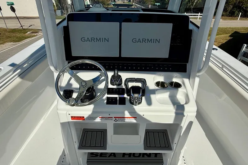 Slide: The Image of 2026 Sea Hunt Gamefish 30 Coffin Box helm with dual Garmin displays and controls. - 11