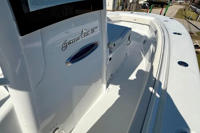 Slide: The Image of 2026 Sea Hunt Gamefish 30 Coffin Box boat interior, showcasing sleek design and spacious layout. - 16