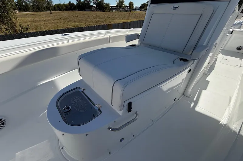 Slide: The Image of 2026 Sea Hunt Gamefish 30 Coffin Box interior with cushioned seating and storage. - 22