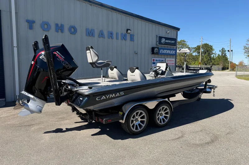 Slide: The Image of 2026 Caymas XS 21 Pro boat at Toho Marine dealership, featuring sleek design and powerful engine. - 15
