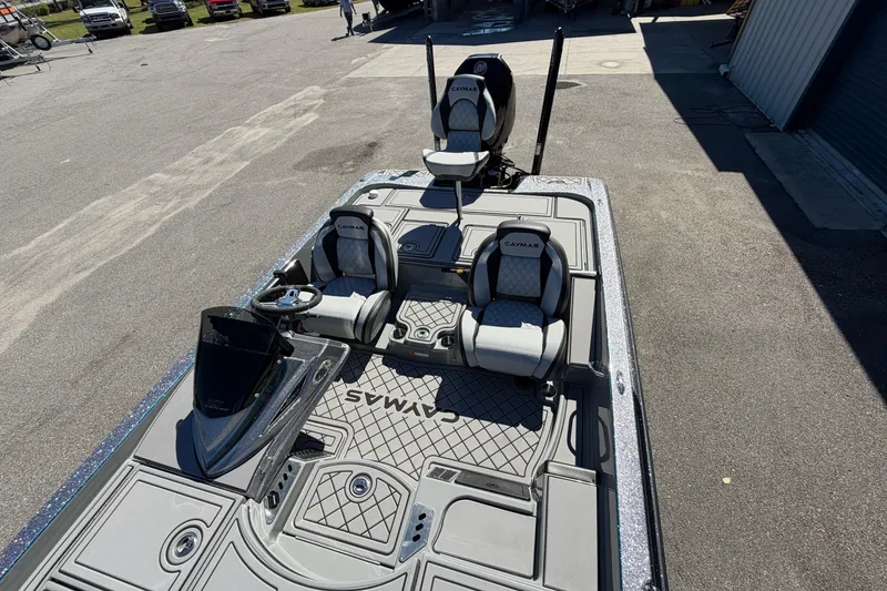 Slide: The Image of 2026 Caymas XS 21 Pro boat with sleek seating and modern design on display. - 9