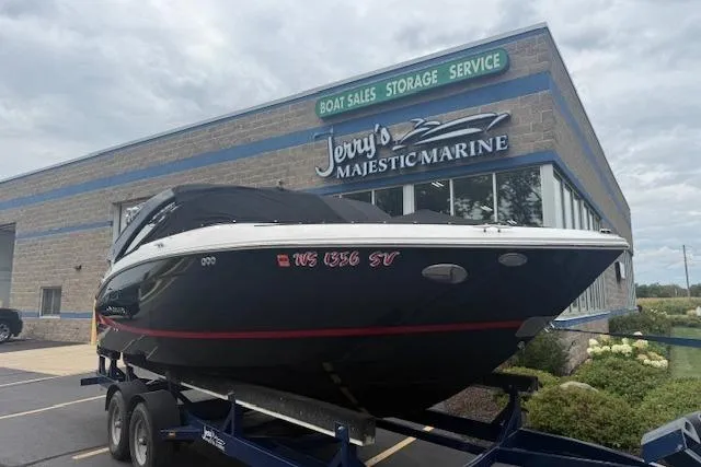 Slide: The Image of 2021 Regal LS4 Surf boat on trailer at Jerry's Majestic Marine dealership. - 31