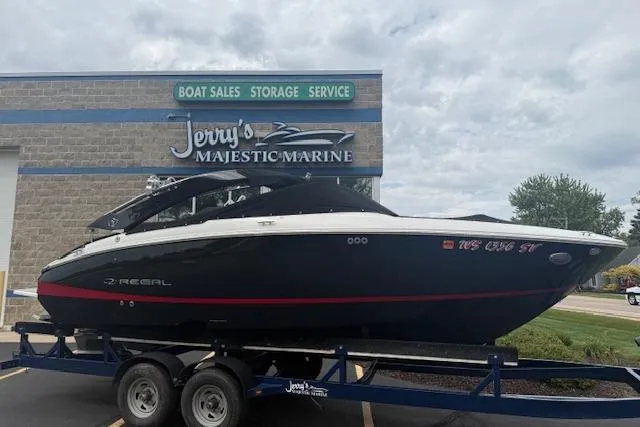 Slide: The Image of 2021 Regal LS4 Surf boat on trailer at Jerry's Majestic Marine dealership. - 32
